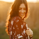 stylish-woman-spending-time-summer-field_1157-36096