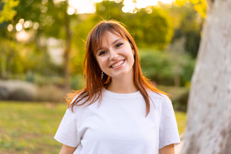 young-pretty-redhead-woman-outdoors-with-happy-expression_1368-335890